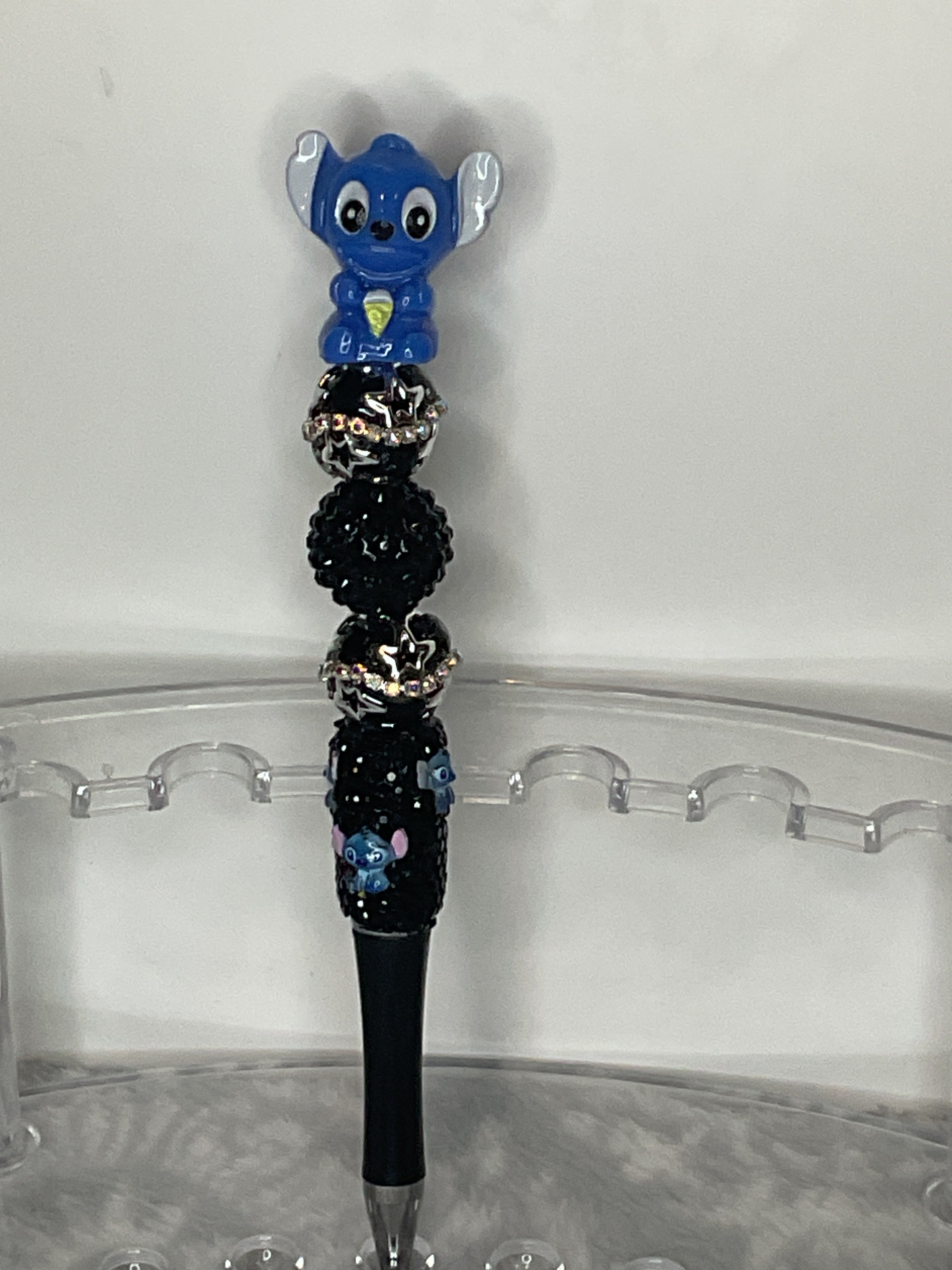 Blue stitch on a black stitch pen
