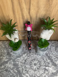 Black and pink bows with fancy beads