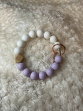 Purple and white beaded wristlet