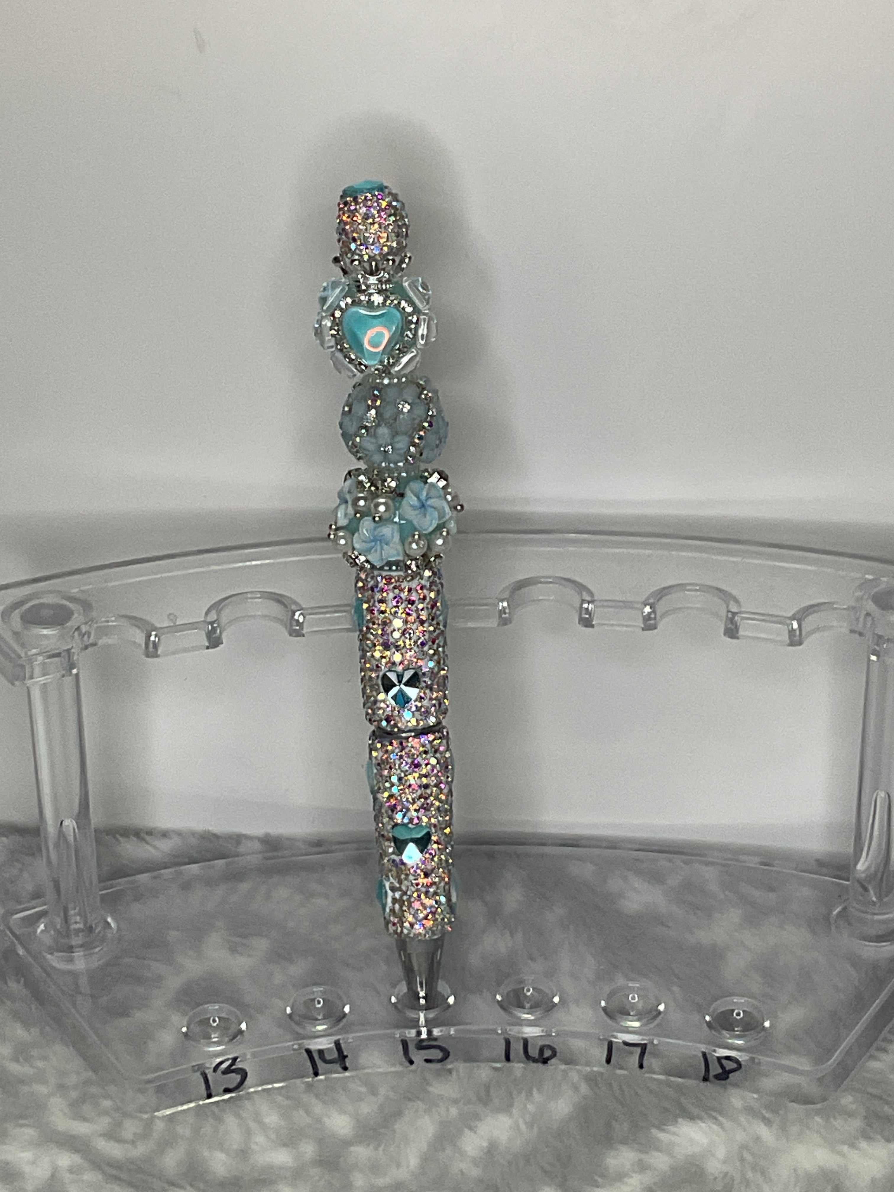 Clear rhinestone pen with blue hearts