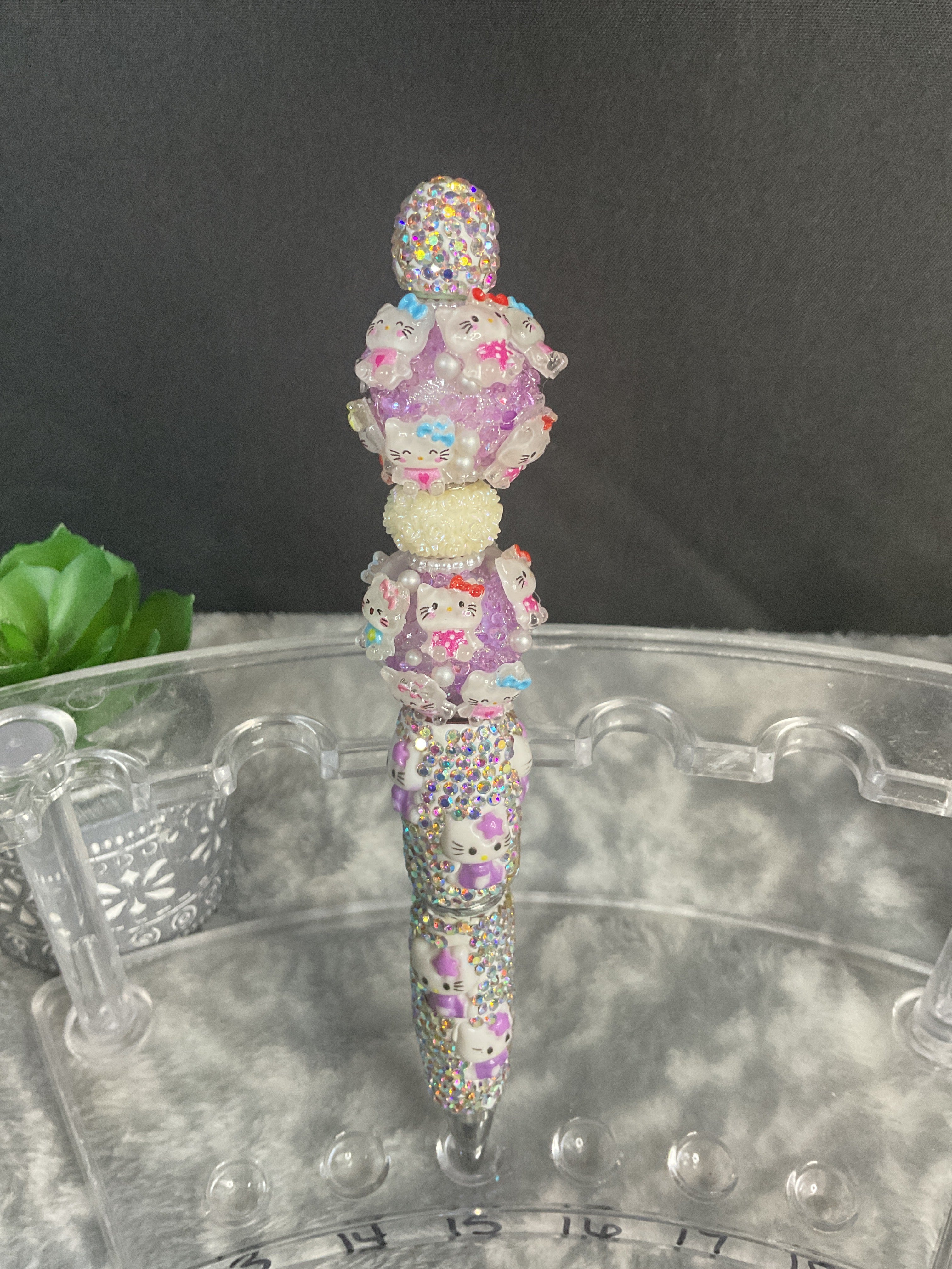 Hello Kitty, purple fancy pen