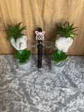 Black rhinestone pan with pink bow and fancy beads