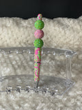 Pink and green rhinestone