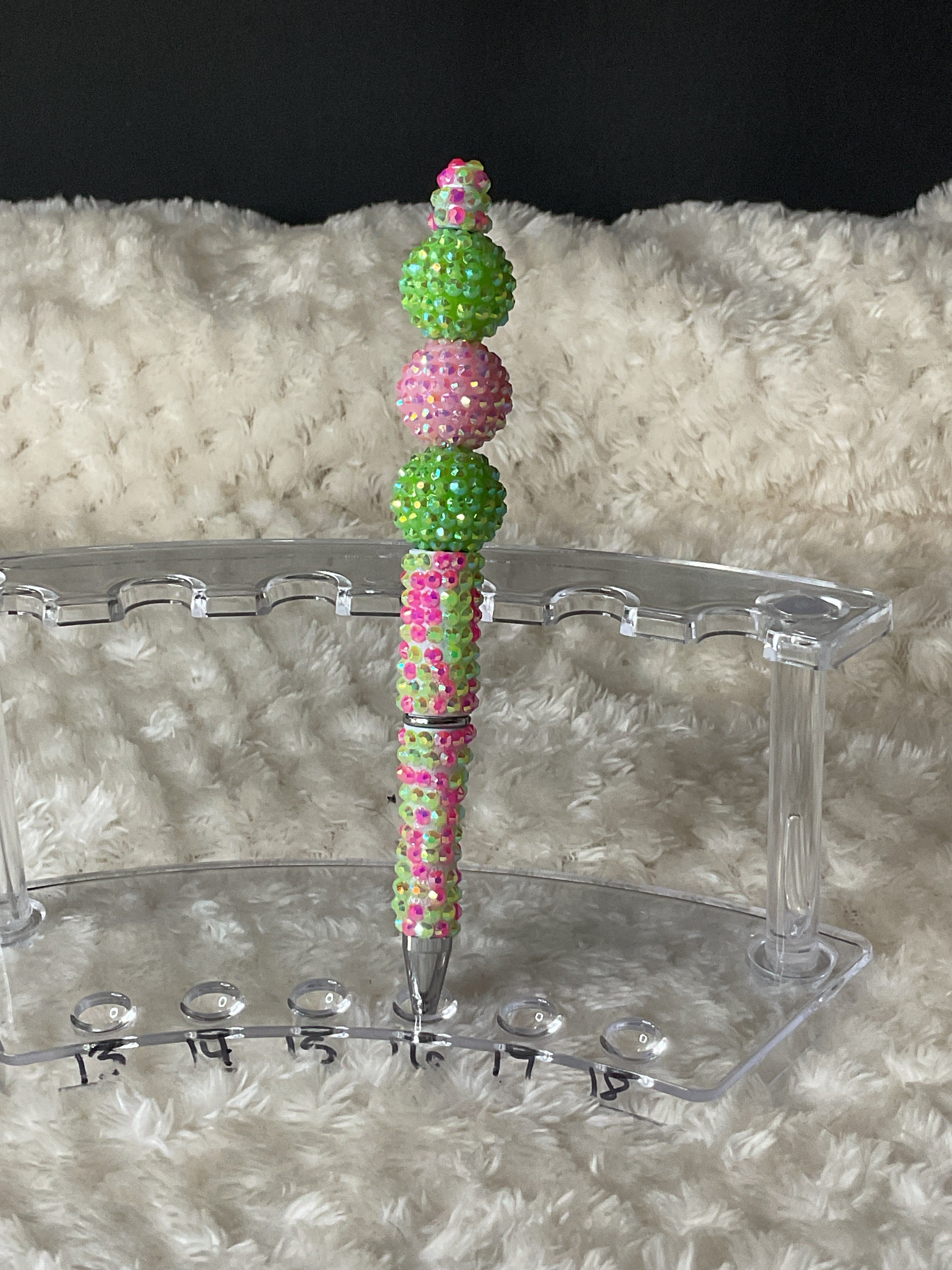 Pink and green rhinestone