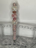 Pink bubble fancy pen with floral fancy beads