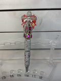 Silver and pink rhinestone pan finish with a pink bow