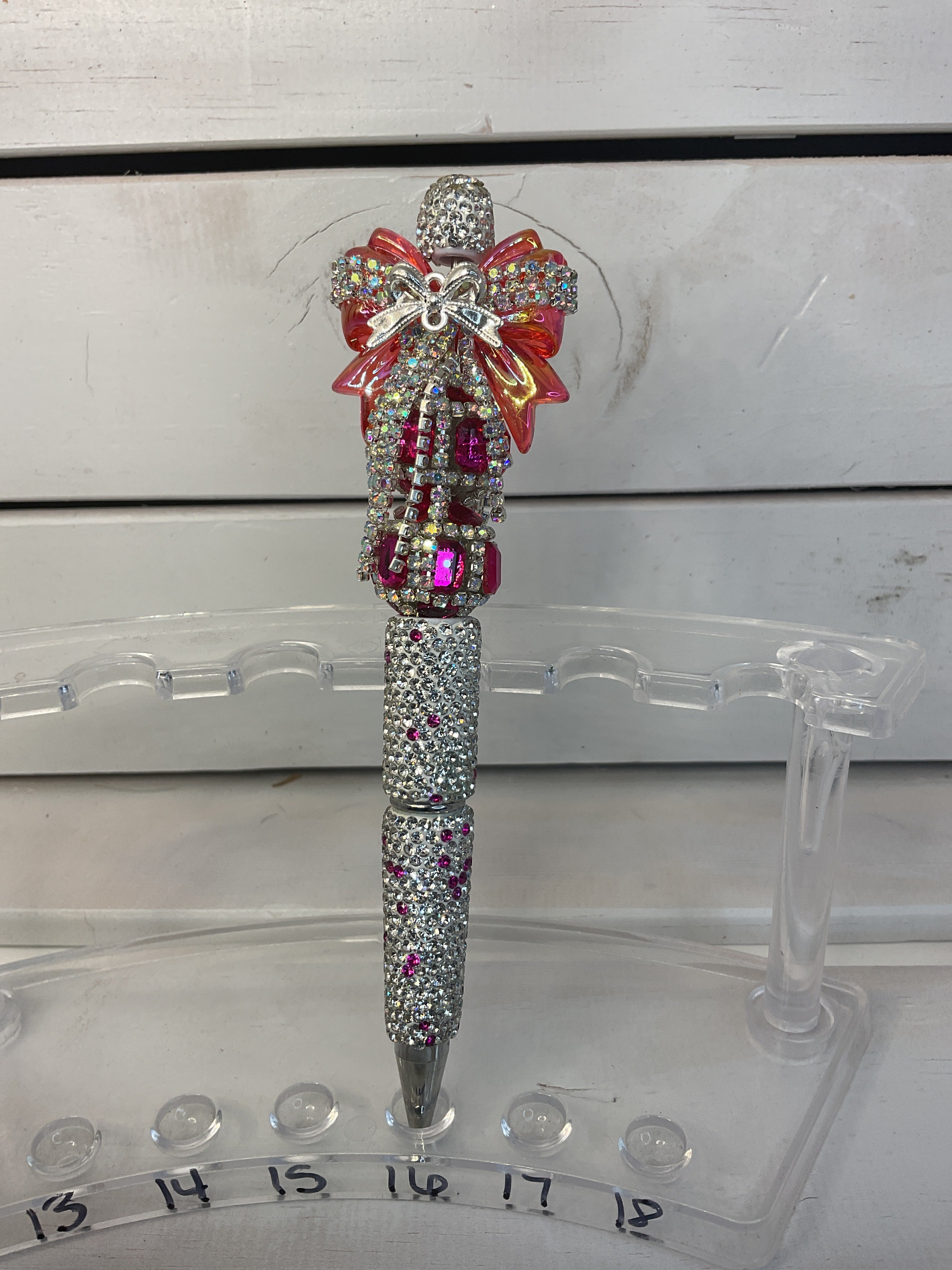 Silver and pink rhinestone pan finish with a pink bow