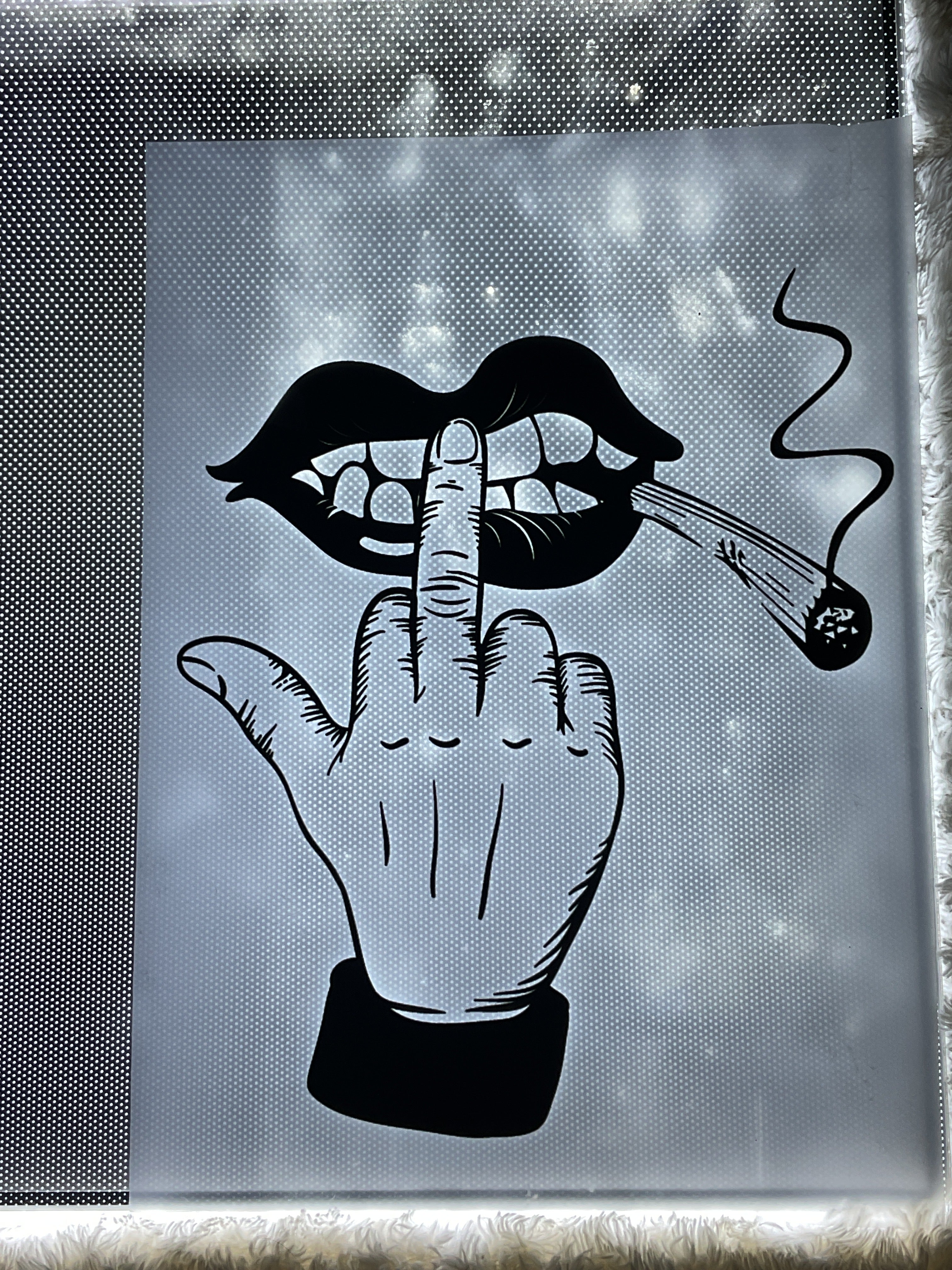 Middle finger with cigarette