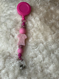 Pink scrub badge, reel