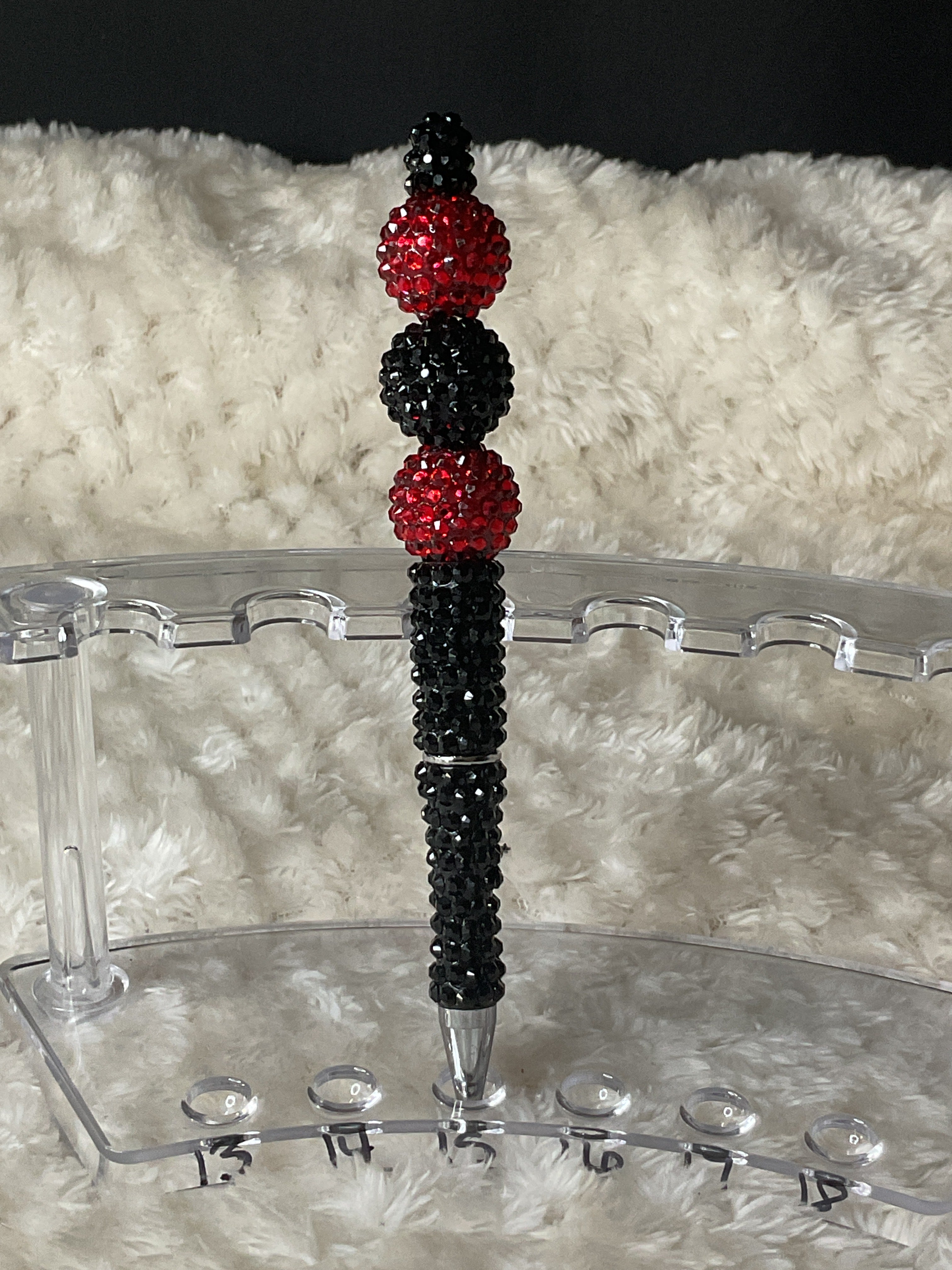 Black and red rhinestone