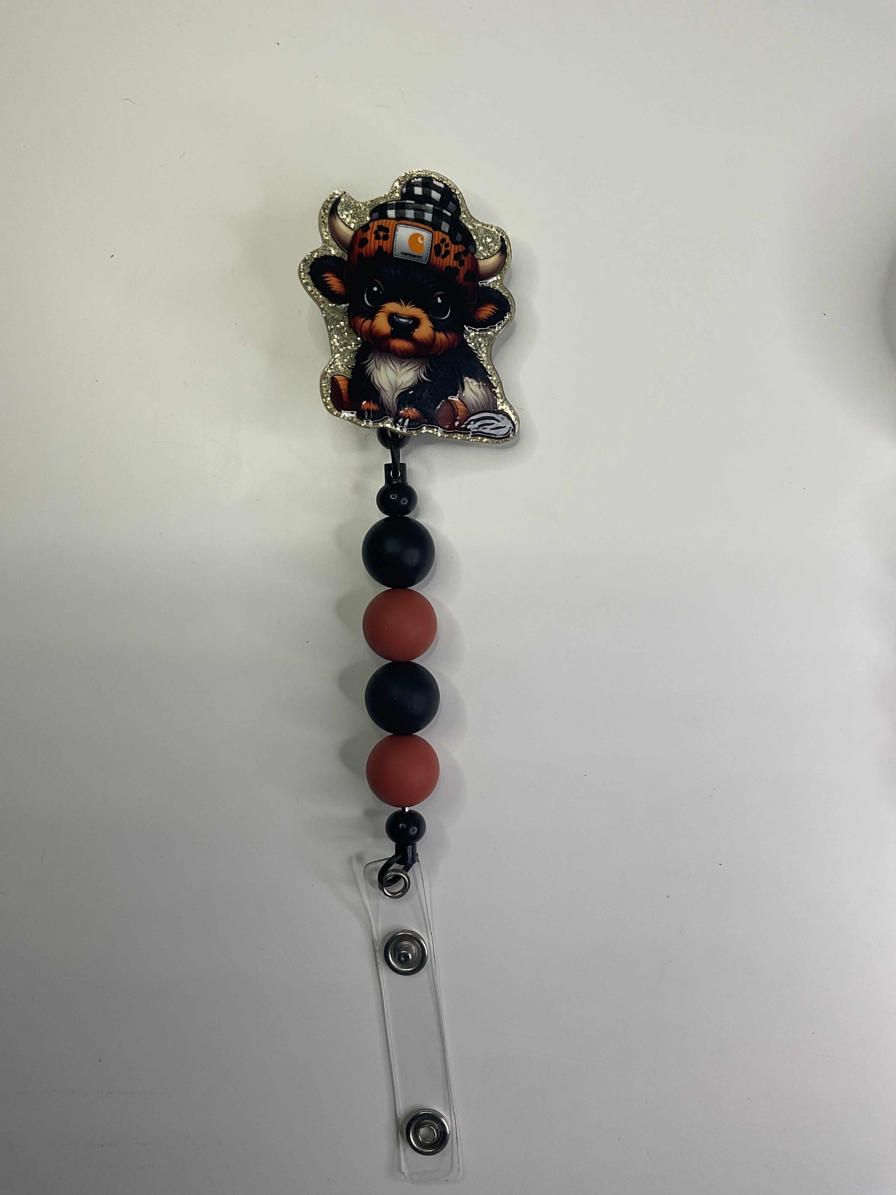 Carhartt Highland cow badge reel