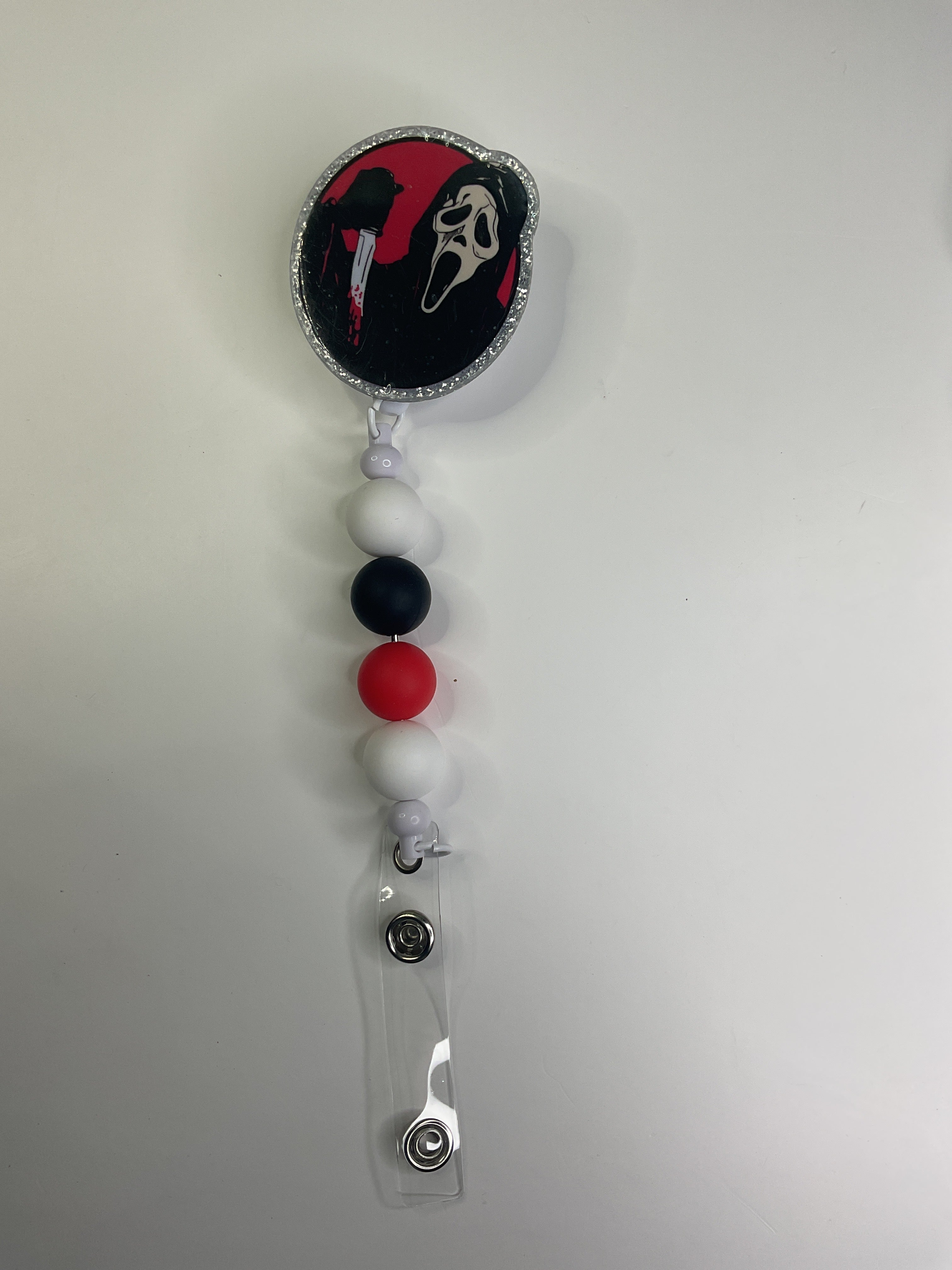 Scream badge reel