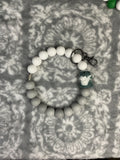 Gray and white Richard wristlet