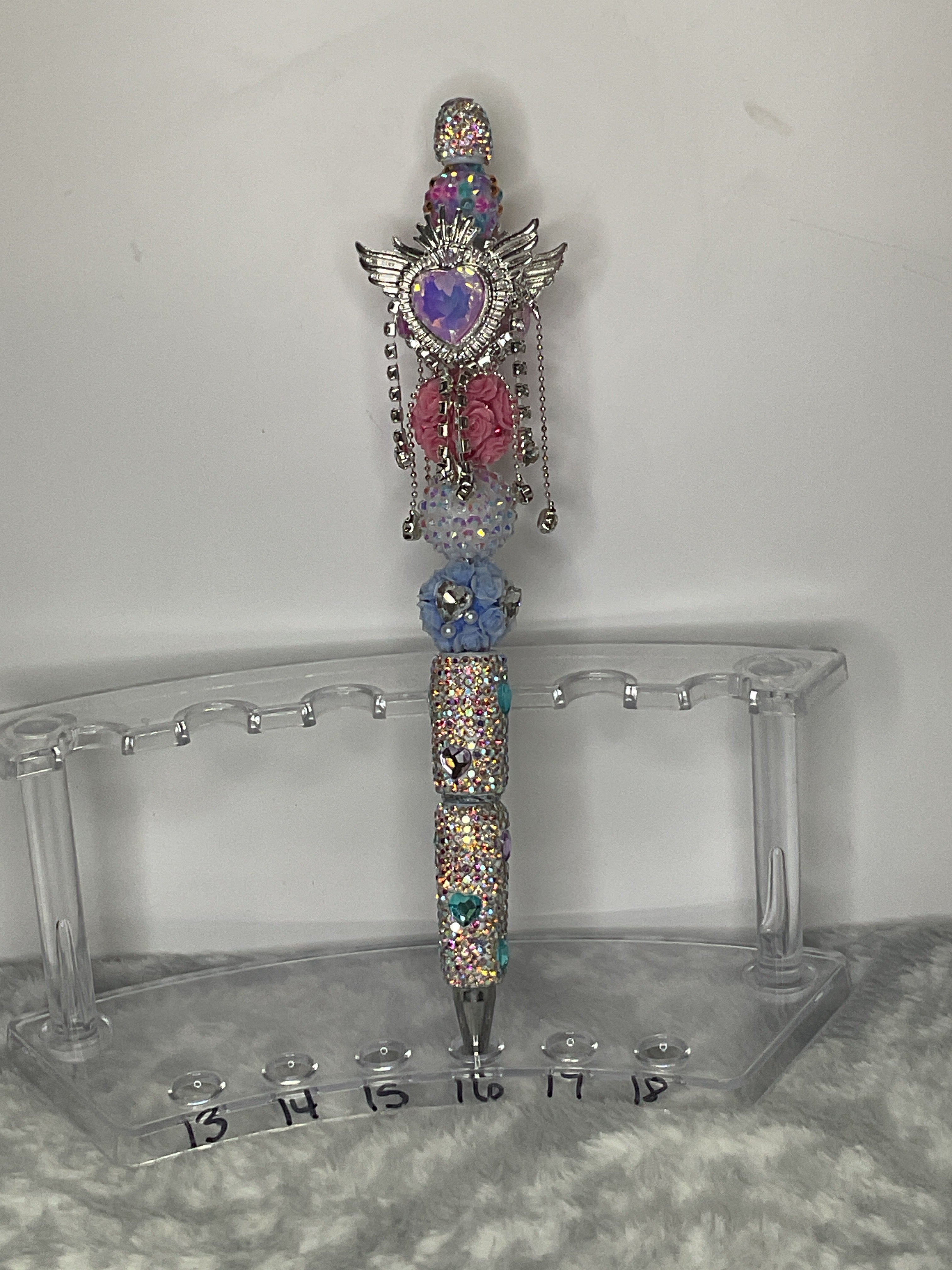 Blue and pink heart with a clear rhinestone pen finished with a, pink heart