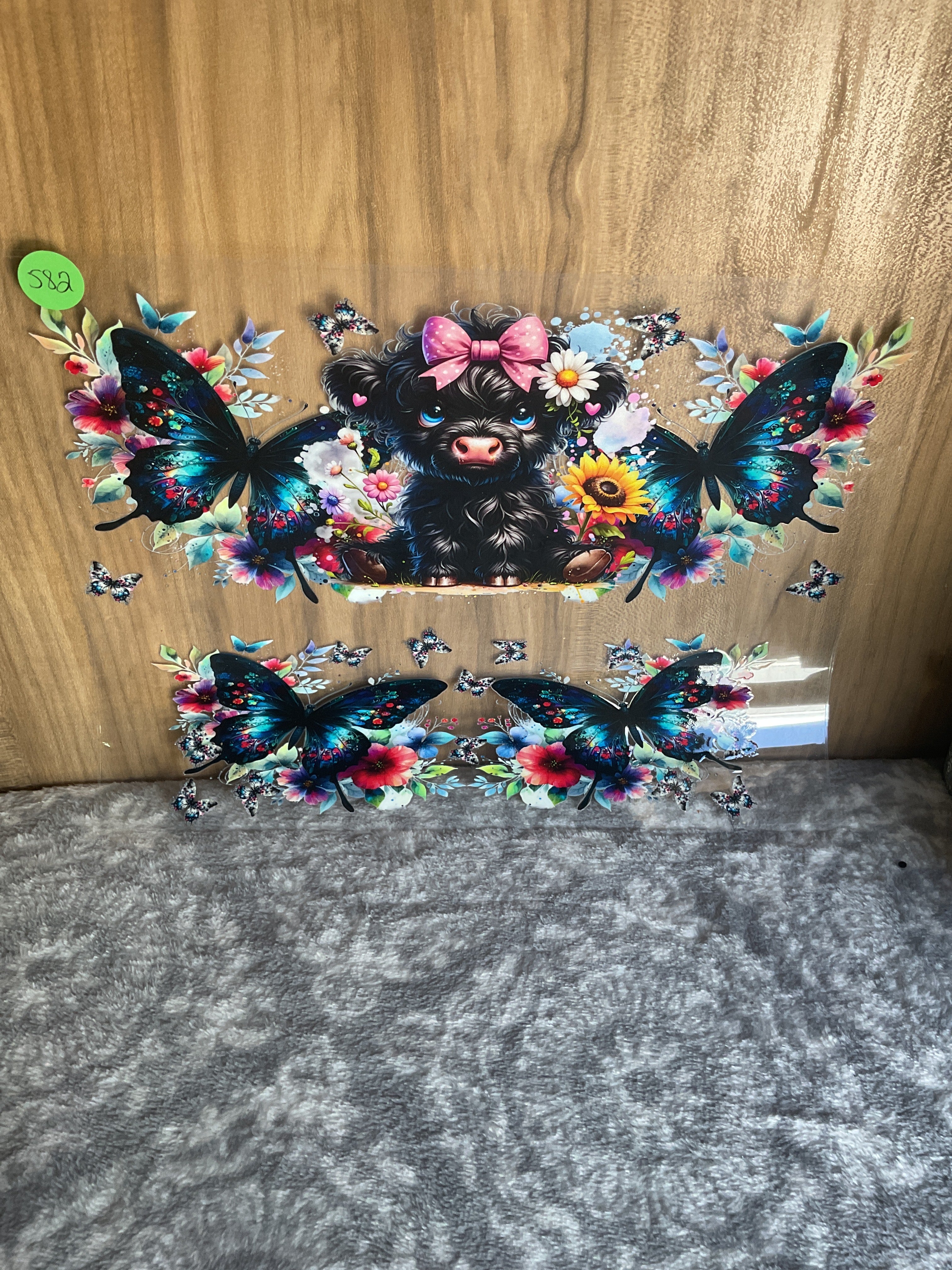 40 ounce black highland cow with butterflies 582