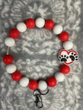 Red and white dog paw wristlet
