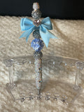 Silver and blue bow pen
