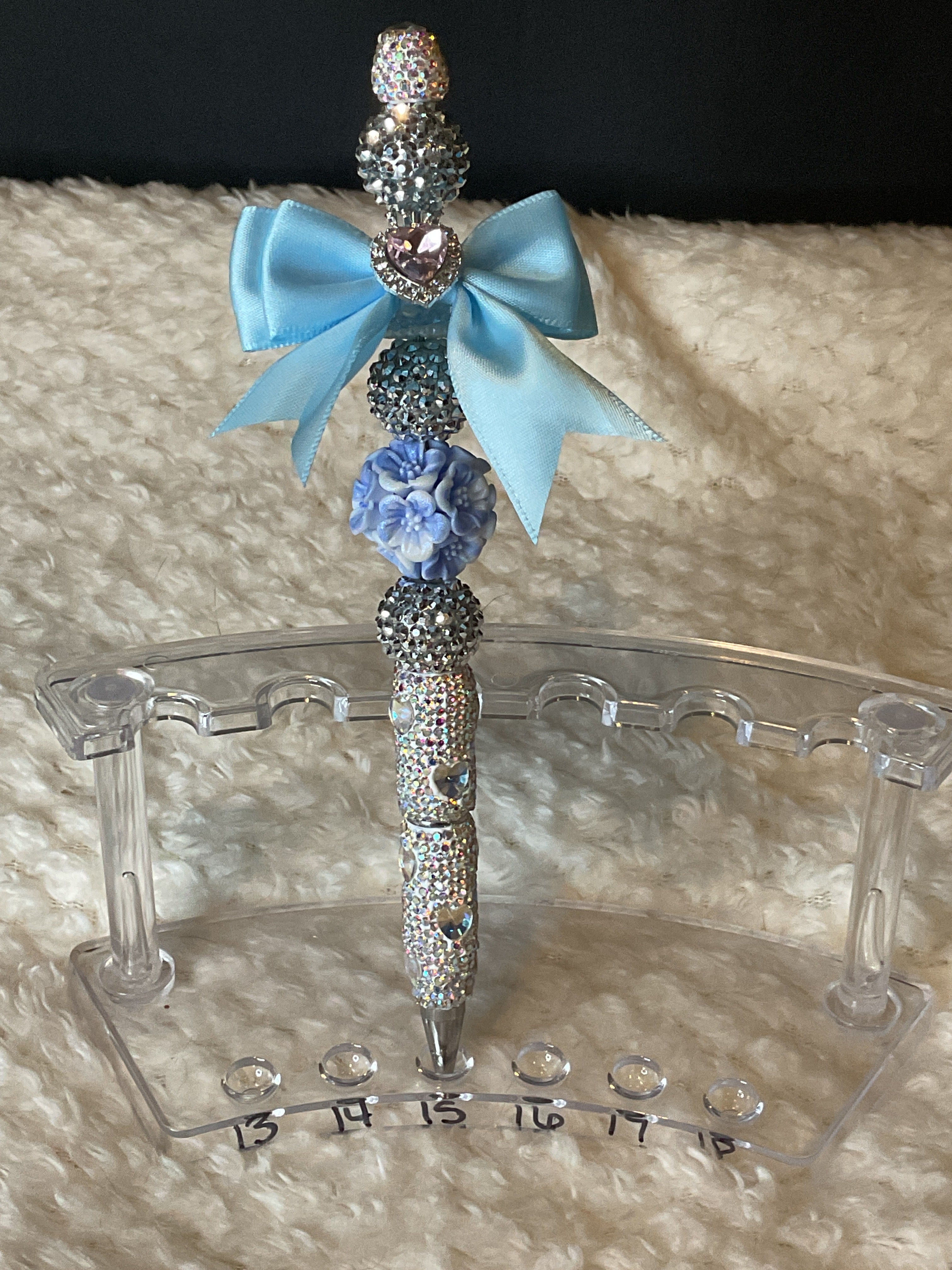 Silver and blue bow pen