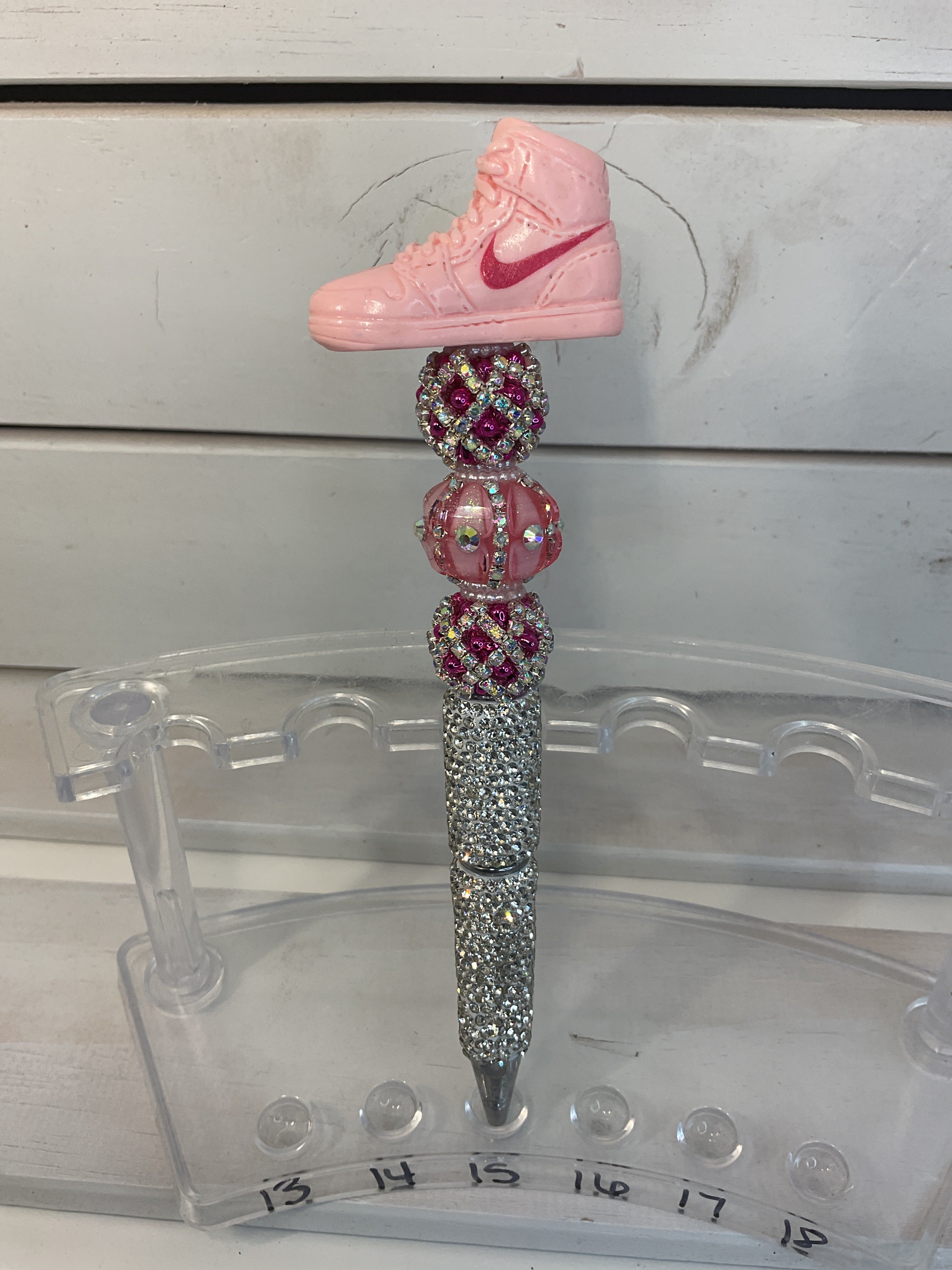 Silver rhinestone pen with Nike shoe