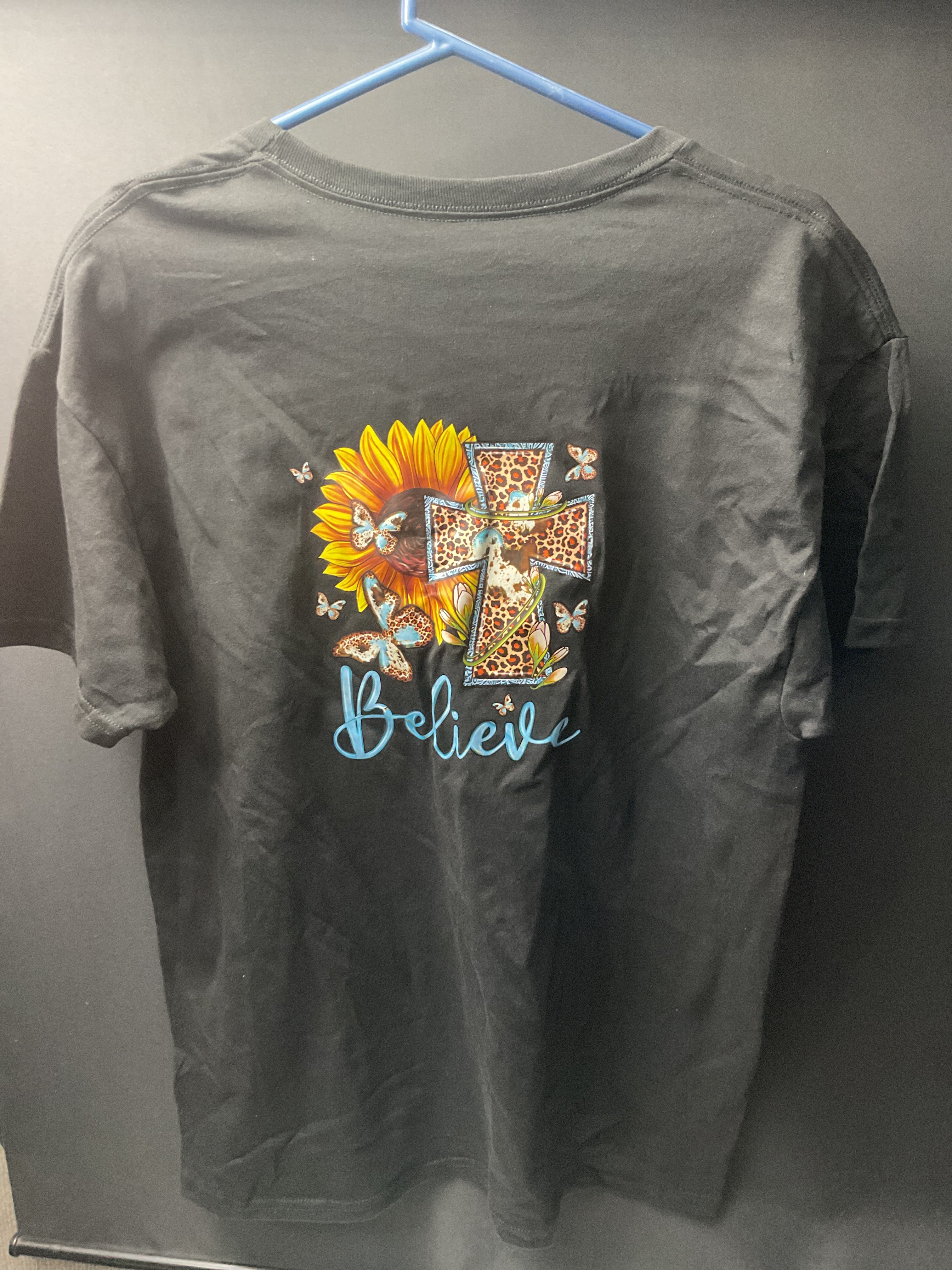 Believe large black tee
