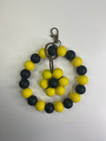 Yellow and black sunflower wristlet