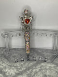 Clear rhinestone with orange hearts