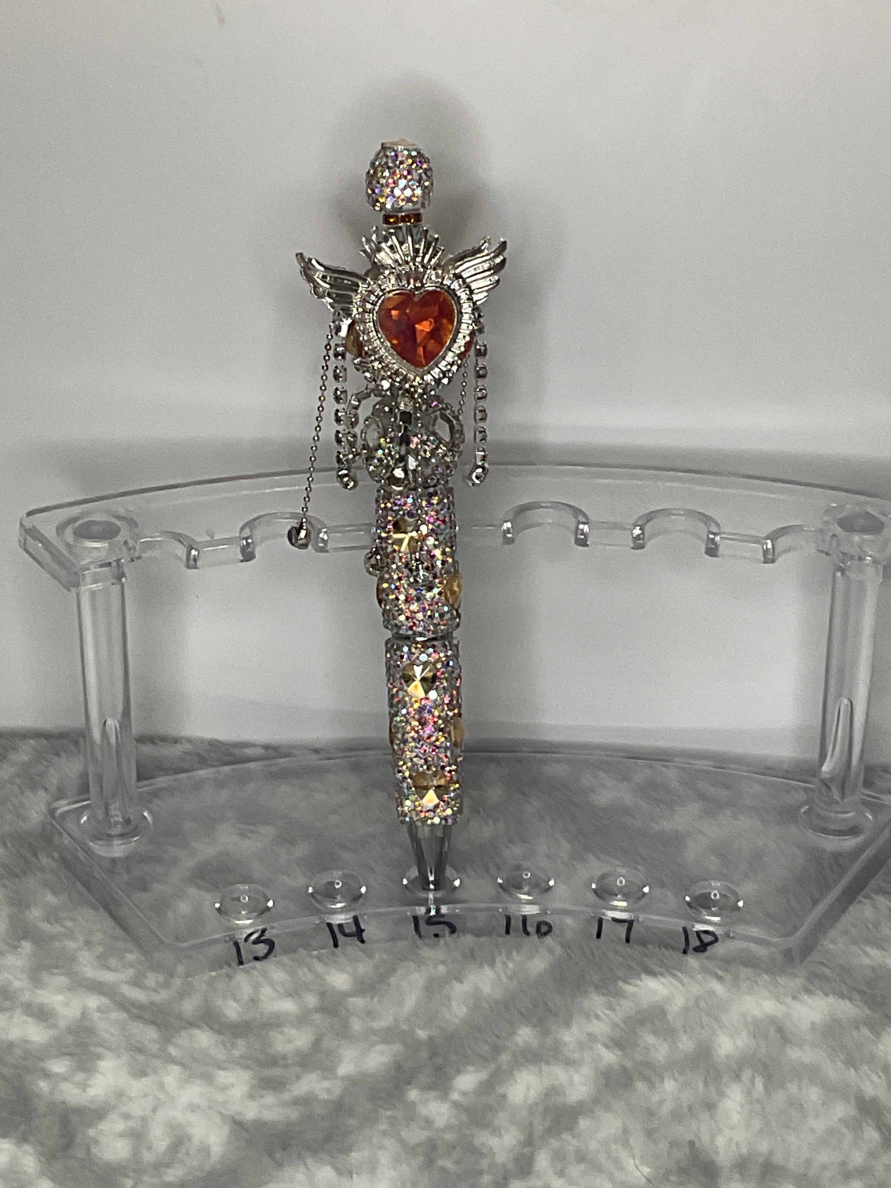Clear rhinestone with orange hearts