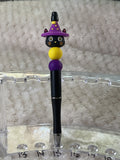 Cat in a purple hat