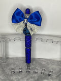 Blue fancy pen with a royal blue bow